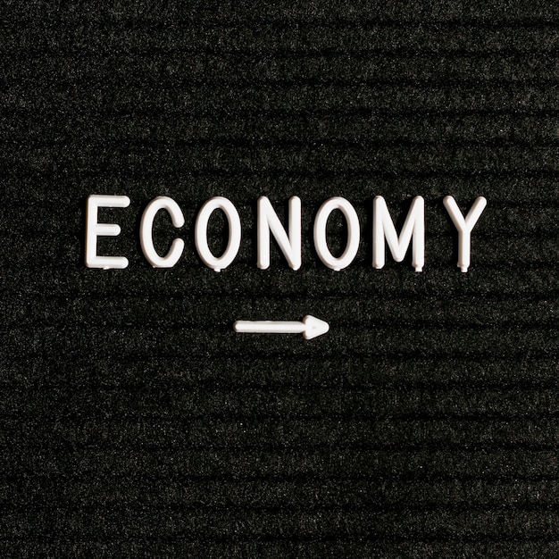 Economy word and pointy arrow