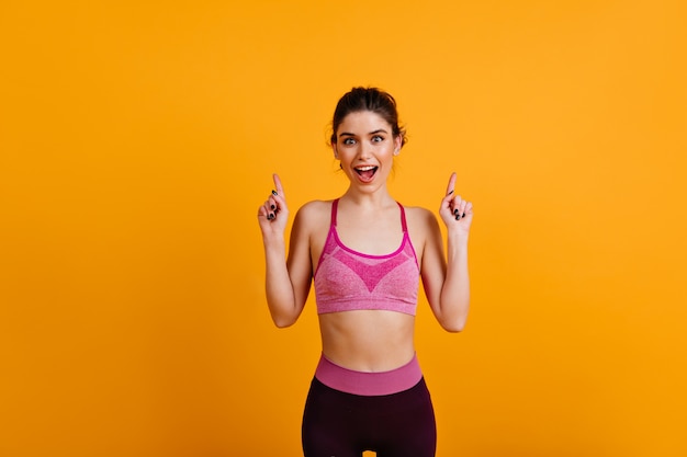 Free photo ecstatic slim lady doing fitness