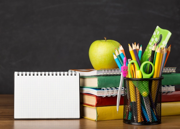 Free Photo education day arrangement on a table with a notepad