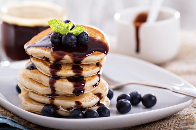 Eggless pancakes with blueberries and chocolate