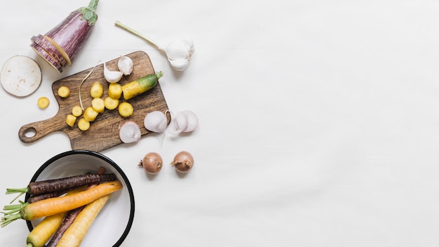 Eggplant; carrot; garlic and onions on white background