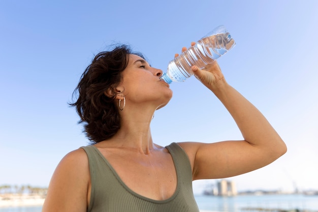 Free Photo elder woman struggling with high temperature