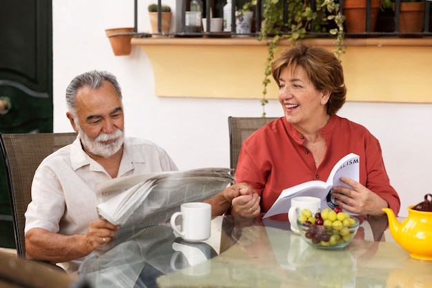 Elderly couple enjoying life at home in the countryside