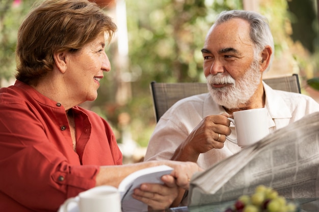 Elderly couple enjoying life at home in the countryside