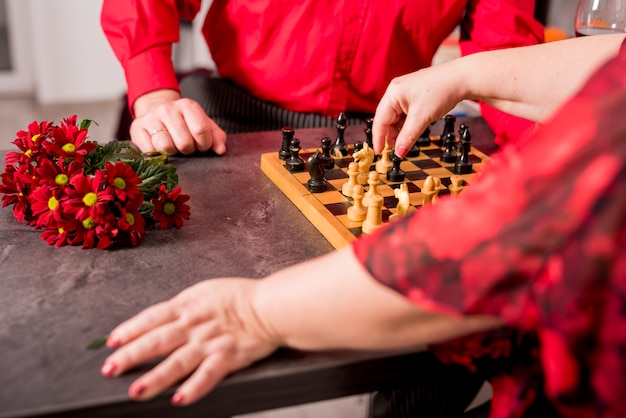 Free Photo elderly couple playing chess