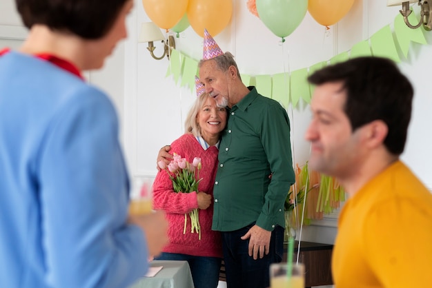 Free Photo elderly people celebrating their birthday