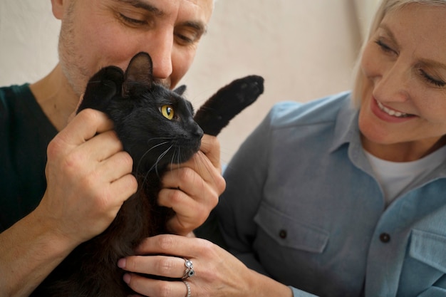 Free Photo elderly person spendng tim with their pets