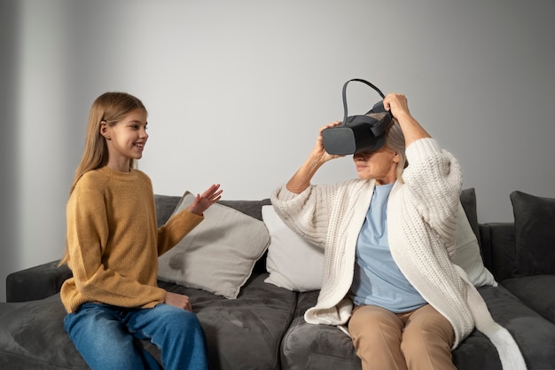 Free photo elderly person using vr set for game immersion