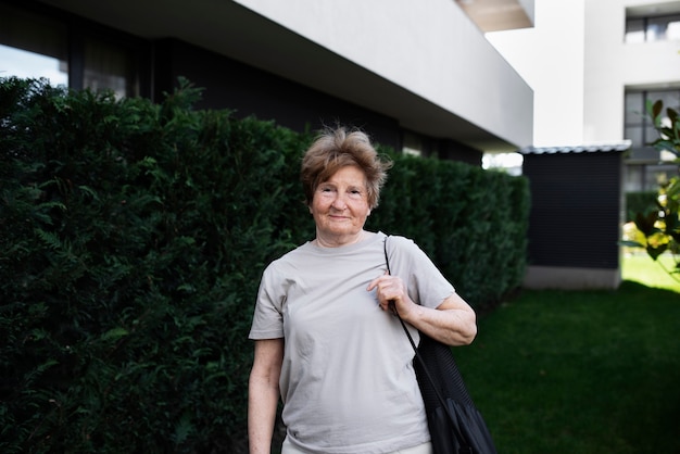 Elderly woman walking in the city