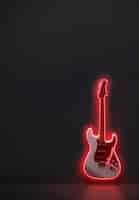 Free photo electric guitar with neon light