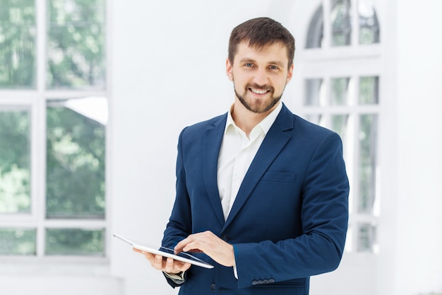 The elegant businessman in  the office