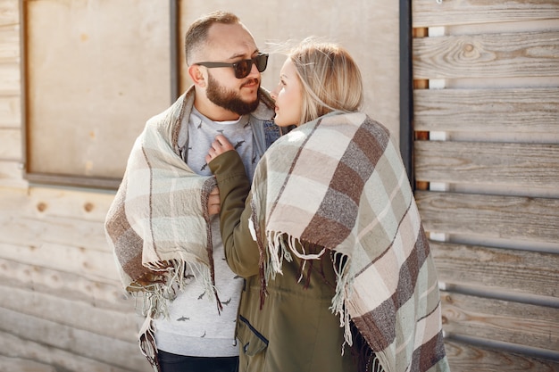 Free photo elegant couple in a winter park