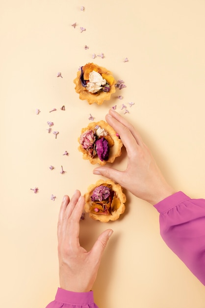 Elegant eco food concept with flowers in dessert tart