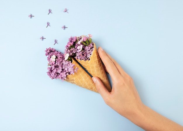 Elegant eco food concept with flowers in ice cream cone