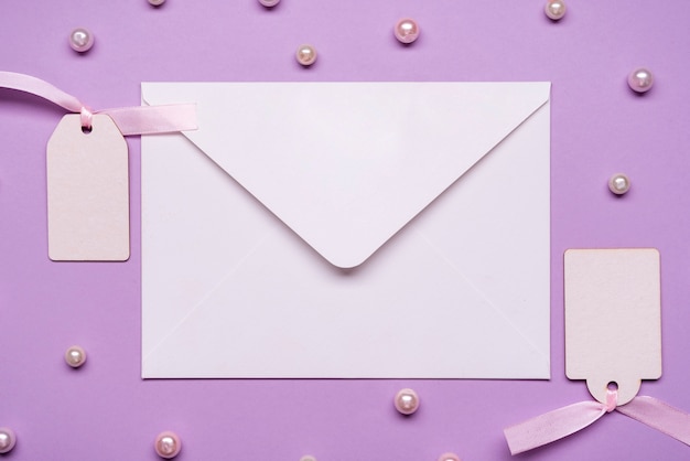 Elegant envelope surrounded by pearls