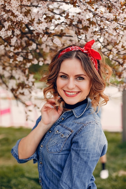 Elegant girl in a spring park