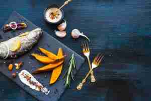 Free photo elegant healthy food composition with fish