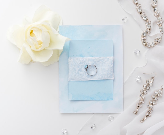 Free photo elegant jewellery for bride on table