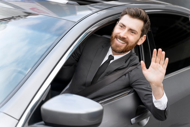 Free Photo elegant male taxi driver in costume