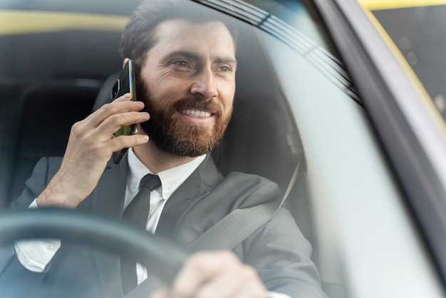 Free Photo elegant male taxi driver in costume