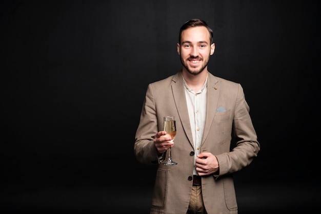 Elegant man toasting for new years