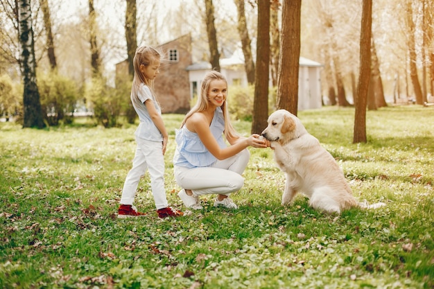 elegant mother with cute daughter 