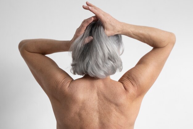 Elegant old woman back portrait