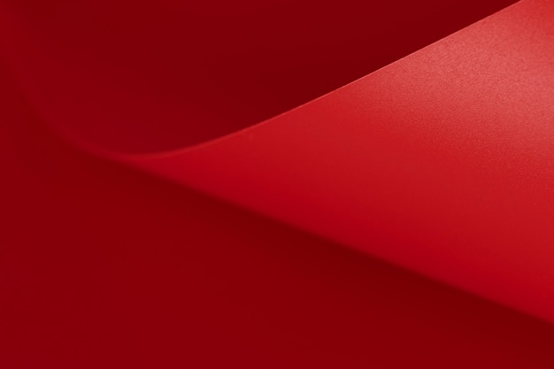 Free photo elegant red paper copy space surface