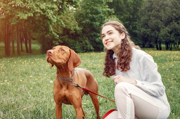 Elegant and stylish girl in a spring park