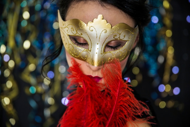 Elegant woman celebrating venetian carnival