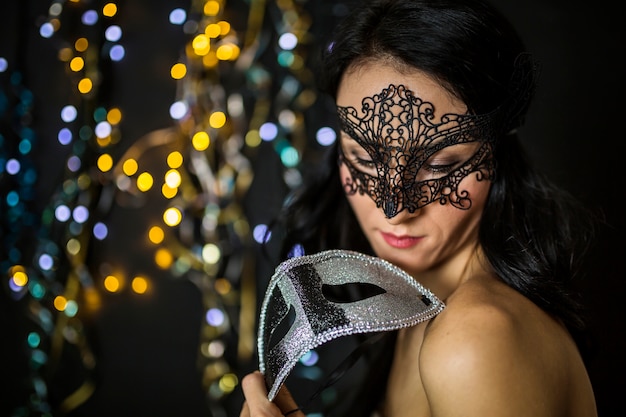 Free Photo elegant woman celebrating venetian carnival