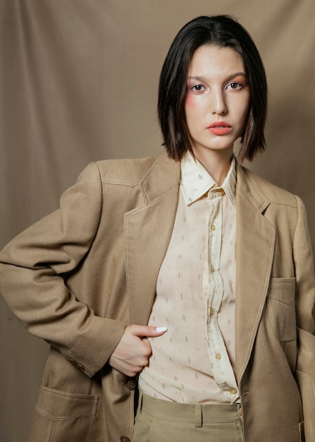 Elegant woman posing in classic suit