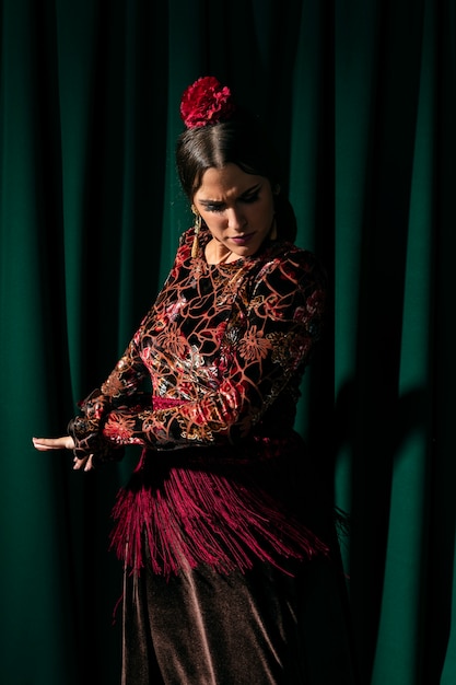 Elegant young woman looking down