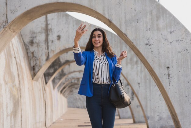 Elegant young woman smiling for the photo