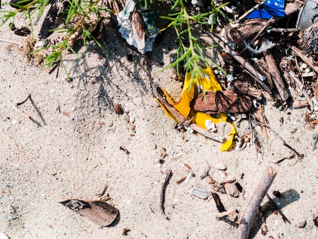 Elevated view of garbage on sand at outdoors