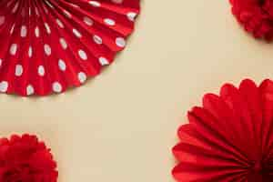 Free photo elevated view of red beautiful origami flower pattern