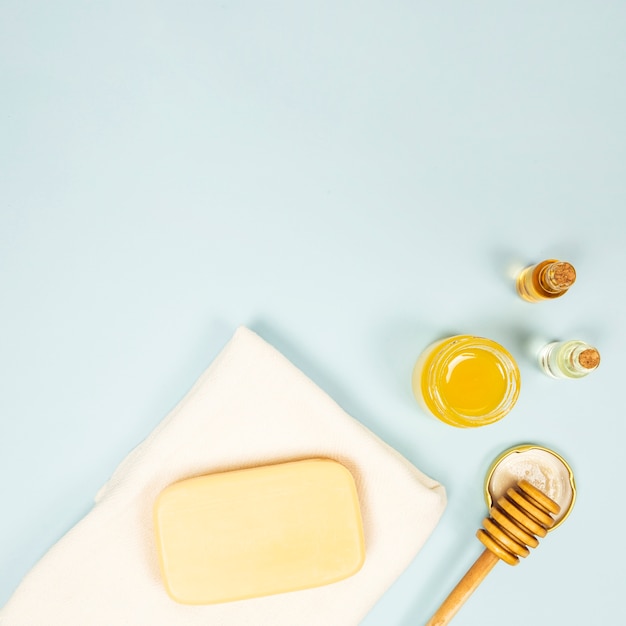 Free Photo elevated view of spa ingredient over blue background