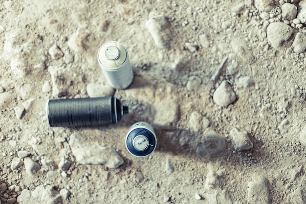 Free Photo elevated view of three aerosol cans