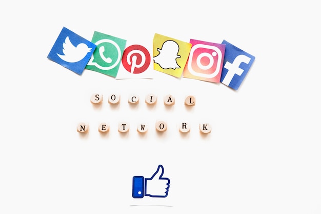 Free Photo elevated view of various mobile application icons, social network word and thumbs up sign