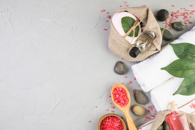 Free Photo elevated view of various spa products on grey backdrop