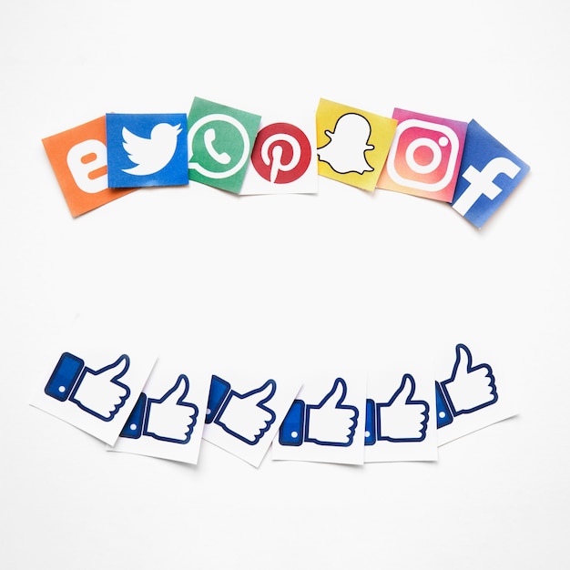 Free photo elevated view of vivid social media and like icons over white background