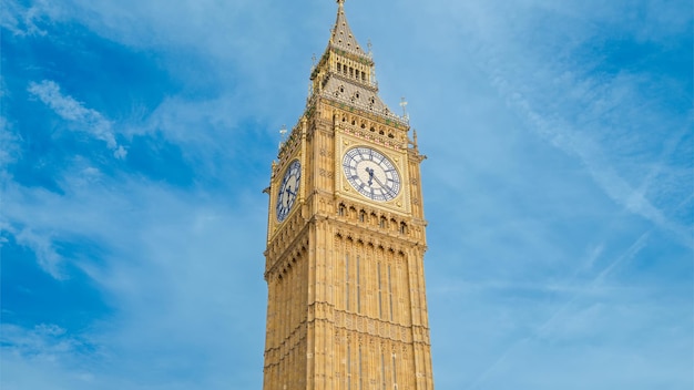 Free Photo elizabeth tower in london downtown united kingdom partly cloudy sky on the background