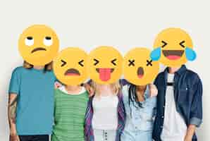 Free photo emoji faced young friends