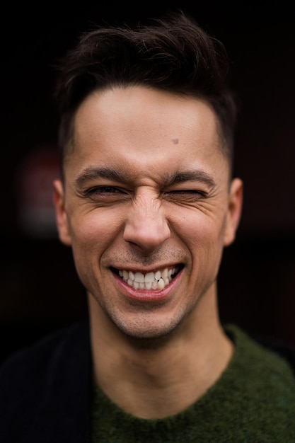 Emotional portrait of a young man closeup