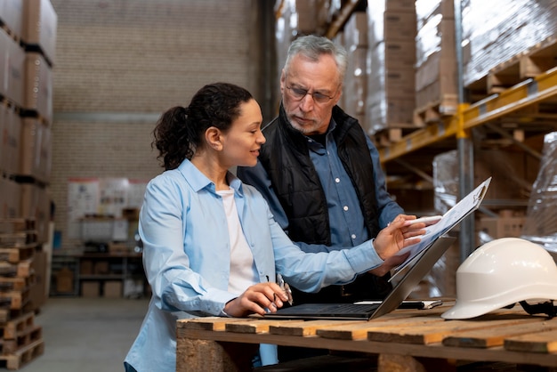 Free Photo employees working in warehouse