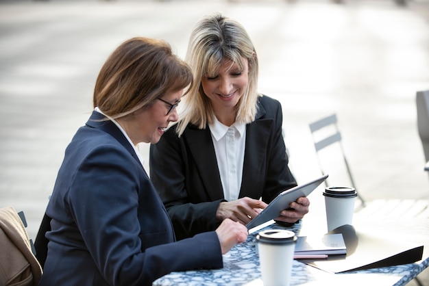 Free photo empowered business women working together