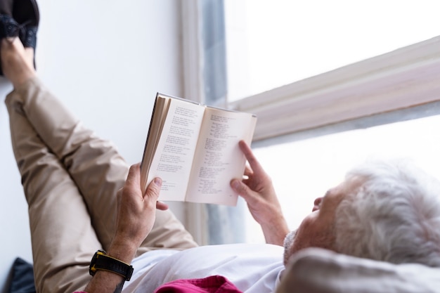 Free Photo empowered grandpa relaxing and having a great time