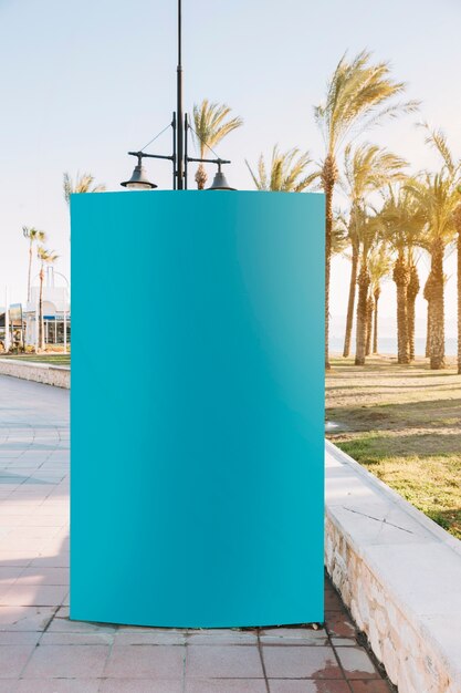 Empty blank advertising stand on sidewalk