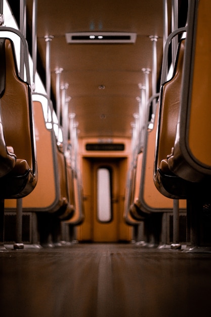 Free Photo empty brown leather seats in the subway in brussels,belgium