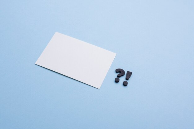 Empty business card and punctuation marks